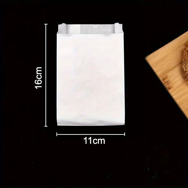 A plain white paper bag without handles, made from eco-friendly materials, ideal for lightweight retail or food packaging